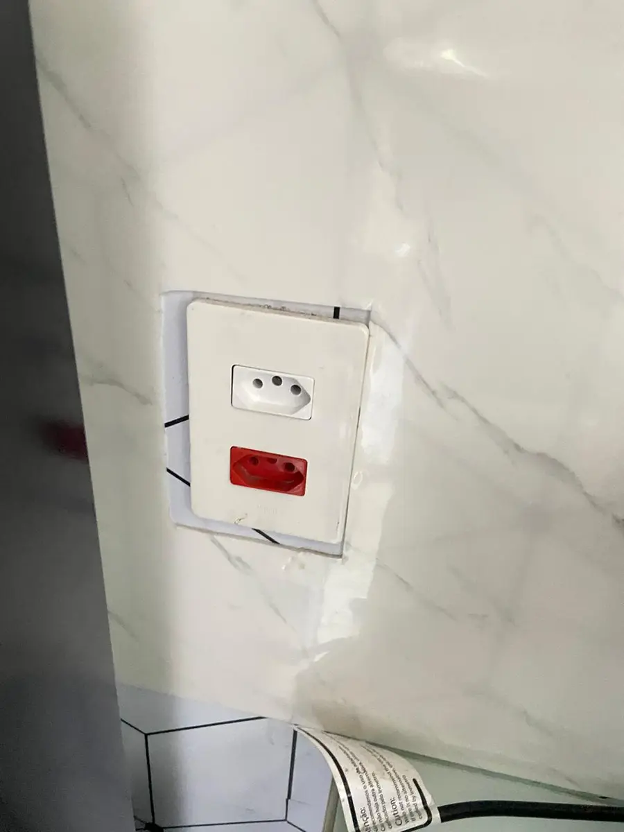 Tomada instalada após correção elétrica realizada pela RG Elétrica